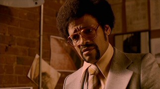 No, that's not Tim Meadows reprising his Ladies Man role Leon Phelps; it's Mario Van Peebles playing Gabe's sage, gay, black co-worker Rocky.