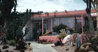 The site of Brad's hostage situation is a pink house, which ties in with the flamingo decor and live pets ("eagles in drag").