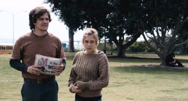 Joined by his fiance Ingrid (Chloe Sevigny), Brad Macallam (Michael Shannon) clutches an "M is for MOM, not maid" pillow, the only thing he needed out of the large army duffel bag he just gave away to a stranger.