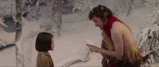 Mr. Tumnus (James McAvoy) makes a point to Lucy (Georgie Henley) in her first moments on Narnia.