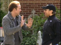 Nicolas Cage practices his mime work for shades-wearing producer Jerry Bruckheimer.