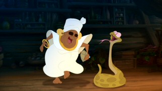 Neither blindness nor being 200 years old prevents priestess Mama Odie from dabbling in song and dance with her snake Juju.