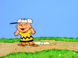 Charlie Brown toys with the notion of stealing home plate in "Charlie Brown's All Stars!", the second Peanuts animated special.