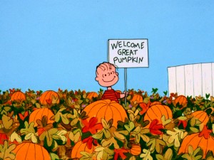 Linus stands alone in a pumpkin patch awaiting the arrival of the Great Pumpkin.