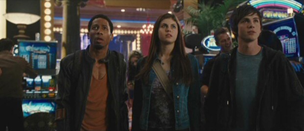 Grover Underwood (Brandon T. Jackson), Annabeth Chase (Alexandra Daddario), and Percy Jackson (Logan Lerman) all marvel at the sight of the Lotus Hotel and Casino.