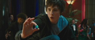 Percy (Logan Lerman) hastily retrieves one of Persephone's pearls, each of which helps lead to the underworld and can be used for instant transportation.