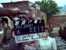 A slate appears before Mickey Rooney, Sean Marshall, and Helen Reddy as they prepare to film a scene on September 28, 1976. This is just one of many behind-the-scenes looks offered in "Brazzle Dazzle Effects: Behind Disney's Movie Magic."