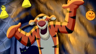 Tigger doesn't quite find the right tone for describing Halloween to a young Heffalump.