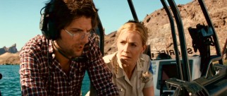 Looking smart and heroic, Novak (Adam Scott) and Sheriff Julie Forester (Elisabeth Shue) seem ready to identify and conquer Lake Victoria's piranha problem.