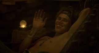 Sergeant Elias (Willem Dafoe) is comfortable in a bunker drinking and smoking up with his subordinate officers.