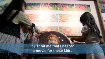 Young children admire a Ponyo exhibit as Miyazaki identifies them as his primary audience in "Creating 'Ponyo'."