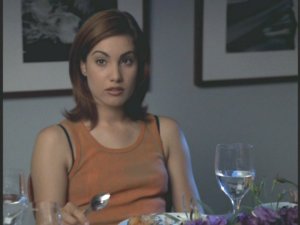 Sam doesn't look she's enjoying dinner.