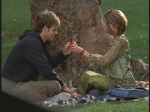 Josh and Lily sitting near a tree, S-I-P-P-I-N-G, first comes cough syrup, then comes marriage...