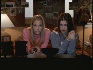 Brooke and Sam watch TV, just like you would be if you were watching "Popular."