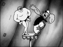 Popeye prepares to knock out The Man on the Flying Trapeze in the short of the same name.