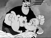 Filling in for barber Wimpy, a funnily-mustachioed Bluto gives Popeye a coarse shave.