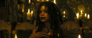 Tia Dalma (Naomie Harris) has some insight for Captain Jack and company. Let's just hope they can understand her!