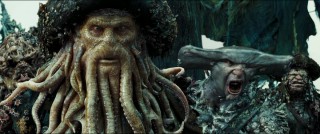 He's no Monkee... Davy Jones (Bill Nighy) rules over the ocean with a claw, some tentacles, and a hammerhead shark henchman.