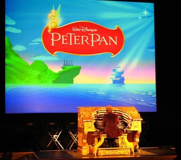 As attendees found seats, the Mighty Wurlitzer delighted the ears with organ versions of classic Disney tunes.