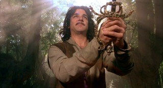 Inigo Montoya holds tightly onto his trusted sword while being showered with heavenly light.