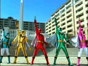 The Power Rangers use their cell phones to summon magic forces. [Standard text messaging rates may apply.]