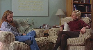 Dr. Sterling coaxes Elizabeth into conversation.