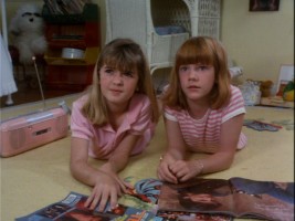 These boy-crazy eleven-year-olds take a moment from ogling Michael J. Fox and other magazine studs to look up.