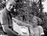 David Swift and Hayley Mills share a funny moment on location, in this still from the Galleries.
