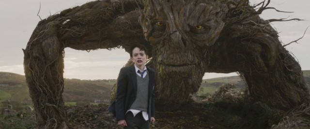In "A Monster Calls", a large tree-like monster (voiced by Liam Neeson) visits a bullied boy (Lewis MacDougall) with a sick mother.