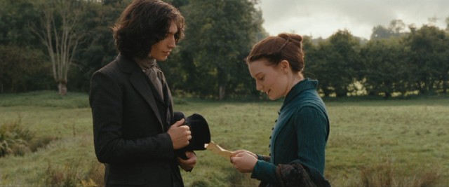 Worldly young law clerk Lon Dupuis (Ezra Miller) impresses Emma Bovary (Mia Wasikowska) with the gift of a Parisian map.