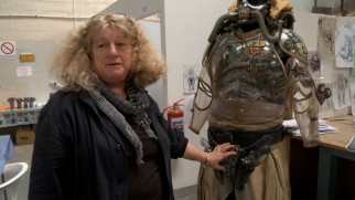Costume designer Jenny Beavan shows off the unusual outfit of Immortan Joe.