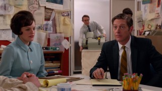 Peggy Olson (Elisabeth Moss) and her new boss Ted Chaough (Kevin Rahm) come to Sterling Cooper, etc. as part of a mid-season merger.