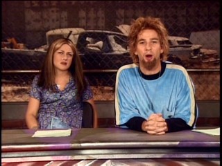 The 1990s styles of News X's Generation X anchors Amy (Nicole Sullivan) and Marsh (David Herman) will take you back in time.