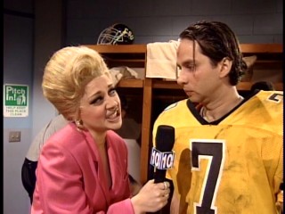 The Vancome Lady (Nicole Sullivan) obnoxiously interviews a quarterback (David Herman) after a loss in the "Superbowl Special."