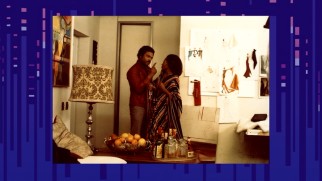 Billy Dee Williams makes a point to Diana Ross in this "Mahogany" photo gallery still.