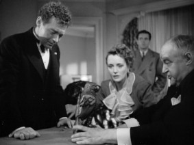 All eyes are fixed on the Maltese falcon in "The Maltese Falcon."