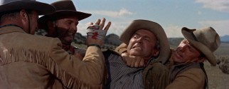 Will Lockhart (Jimmy Stewart) gets a taste of Coronado justice in the form of "a hand for a hand."