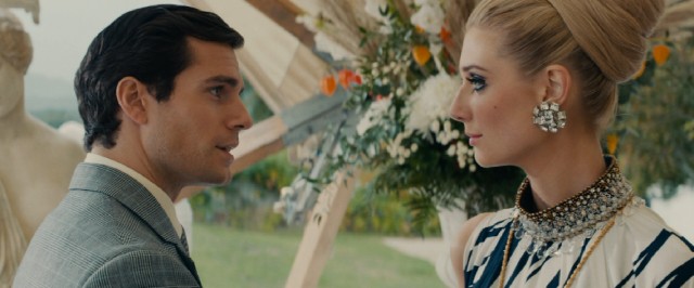 Napoleon Solo (Henry Cavill) faces opposition in wealthy, glamorous Nazi sympathizer Victoria Vinciguerra (Elizabeth Debicki).