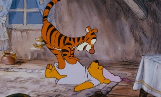 The end of Tigger's tail swings out of frame as he meets Winnie the Pooh and warns him of heffalumps and woozles.