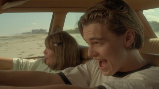 Hank (Leonardo DiCaprio) introduces Bessie (Diane Keaton) to the thrills of driving along an ocean shoreline.