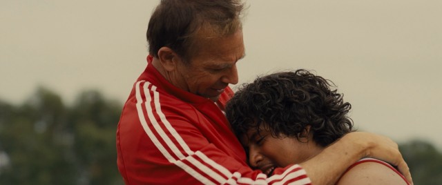 Coach White (Kevin Costner) is proud of his anchor Danny Diaz (Ramiro Rodriguez).