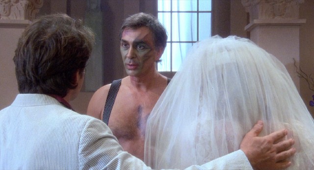 His face colorfully painted by a prostitute, Harold Canterbury (Frank Langella) proceeds to marry Solly and his hooker in the inane finale of "The Men's Club."
