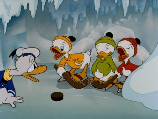 Donald and his nephews Huey, Dewey, and Louie engage in one-upmanship in 1939's "The Hockey Champ."