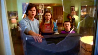 The Heck kids break a window and lie about it in "Wheel of Pain."