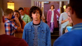 Parental embarrassment is afoot for Axl (Charlie McDermott) at a friend's high school graduation party.