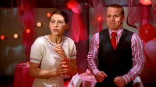 Sue (Eden Sher) and Darrin (John Gammon) make an unlikely but genuine couple at their high school's Valentine's Day dance.