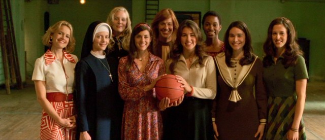 Coach Cathy Rush (Carla Gugino), assistant Sister Sunday (Marley Shelton), and the championship-winning Immaculata College Mighty Macs take a team photo for the newspaper.