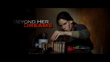 Maggie (Hilary Swank) saves her coins in the theatrical trailer for "Million Dollar Baby."