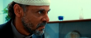 Miral's protective father (Alexander Siddig) discourages her from doing anything that could get her into trouble.