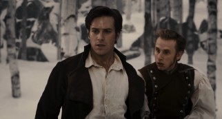 Prince Alcott (Armie Hammer) and his footman Charles Renbock (Robert Emms) repeatedly run into trouble in the snowy woods.